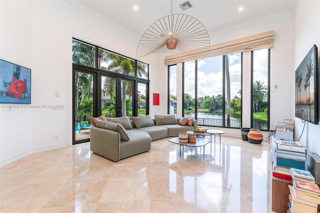 tiled living room with french doors and ornamental molding