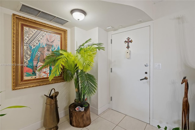 view of tiled foyer entrance