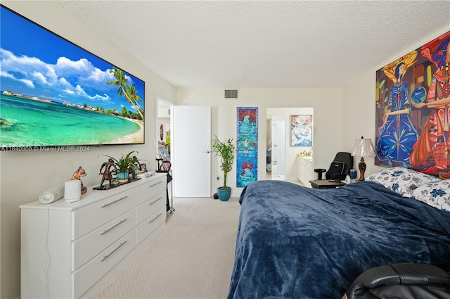 carpeted bedroom with a textured ceiling