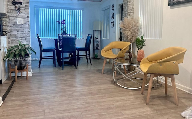 dining area with light hardwood / wood-style floors