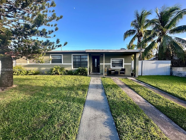 view of front of home with a front yard