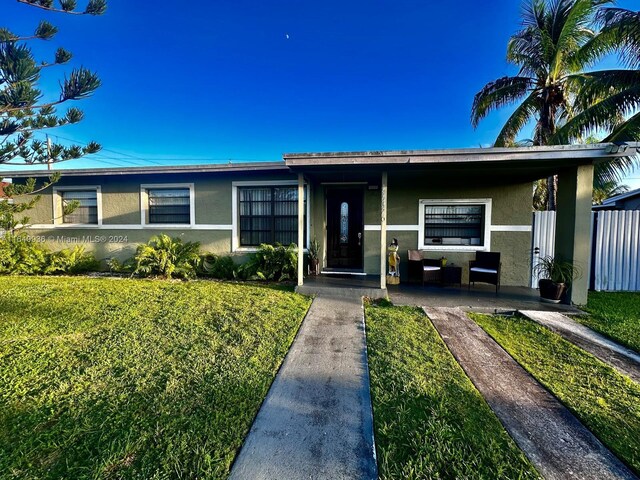 view of front of house with a front yard