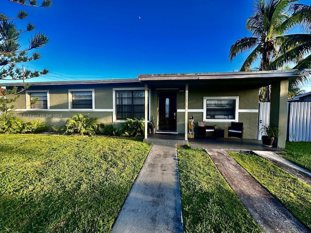 view of front of house with a front yard