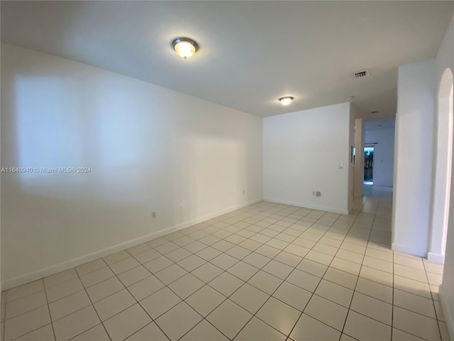 view of tiled spare room