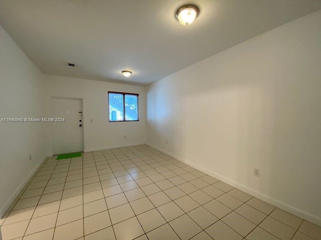 view of tiled spare room