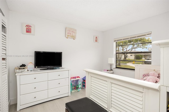 bedroom featuring light hardwood / wood-style flooring