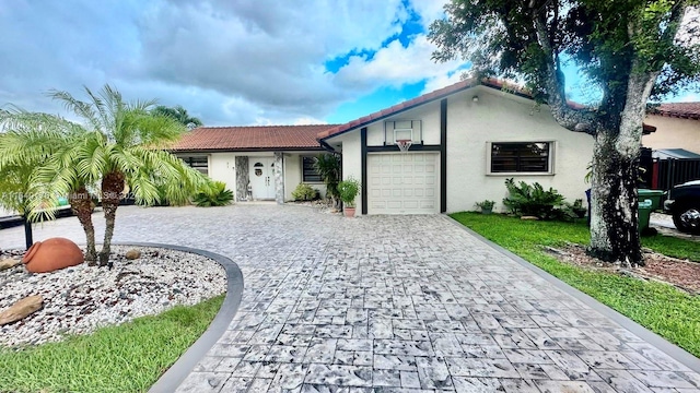 view of front of home featuring a garage