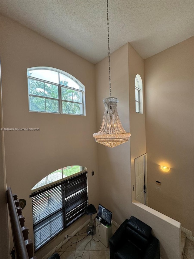 interior details featuring a textured ceiling