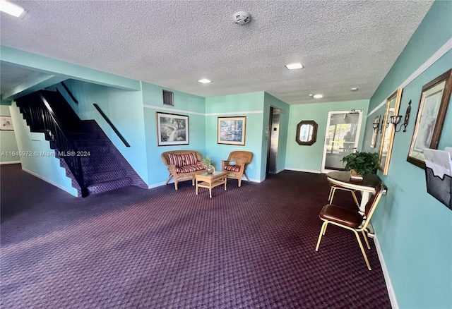 interior space with a textured ceiling