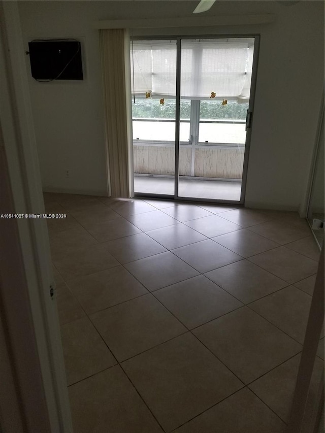 view of tiled spare room