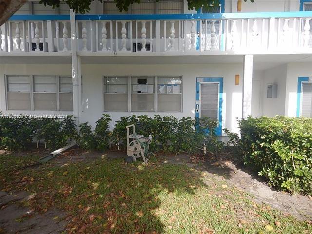 186 Ventnor L Unit 186, Deerfield Beach, FL 33442 - back of property featuring stucco siding