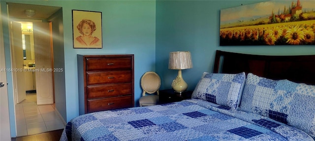 bedroom featuring wood-type flooring