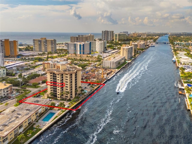 birds eye view of property featuring a water view