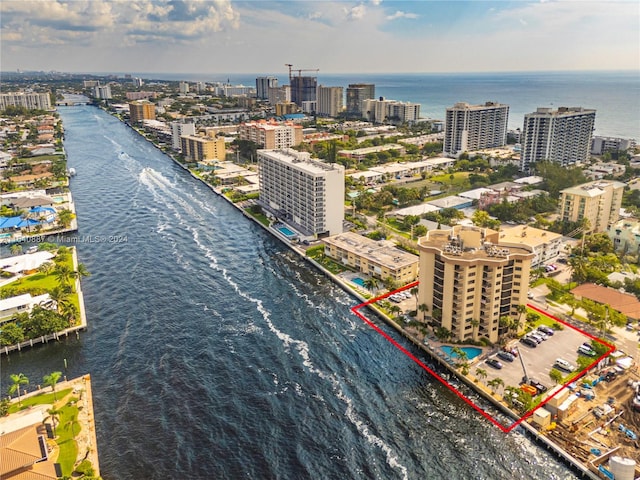 birds eye view of property featuring a water view