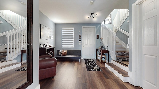 living room with dark hardwood / wood-style flooring