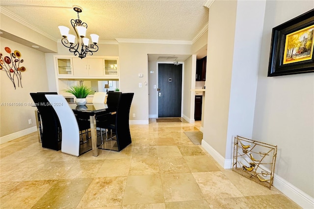 tiled dining area featuring a textured ceiling, crown molding, and an inviting chandelier