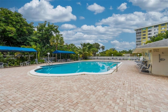 view of pool featuring a patio area