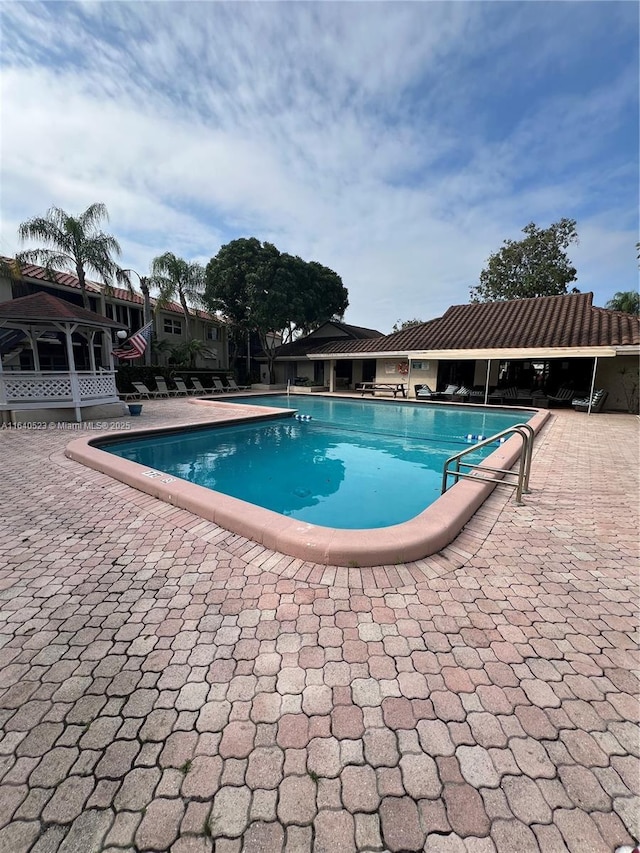 view of pool with a patio area