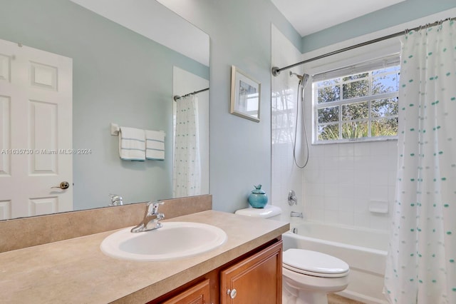 full bathroom featuring vanity, toilet, and shower / bathtub combination with curtain