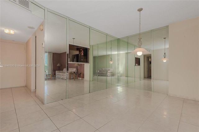 empty room featuring light tile patterned floors