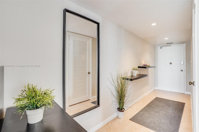 18041 Biscayne Blvd Unit 1404, Aventura, FL 33160 - tiled foyer featuring baseboards and recessed lighting