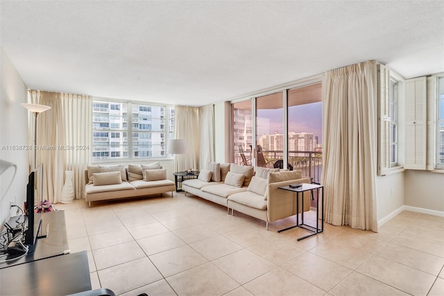 18041 Biscayne Blvd Unit 1404, Aventura, FL 33160 - living area with light tile patterned flooring and a textured ceiling