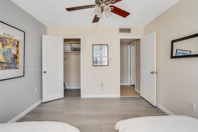18041 Biscayne Blvd Unit 1404, Aventura, FL 33160 - bedroom featuring wood finished floors and ceiling fan