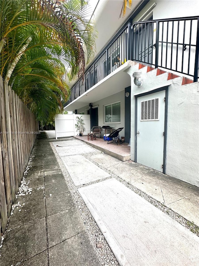 view of patio / terrace with a balcony