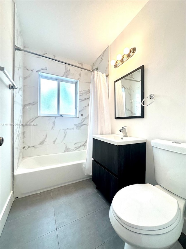 full bathroom featuring shower / bathtub combination with curtain, toilet, vanity, and tile patterned flooring