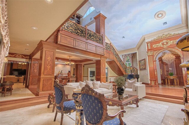 entrance foyer featuring crown molding, wood-type flooring, and a chandelier