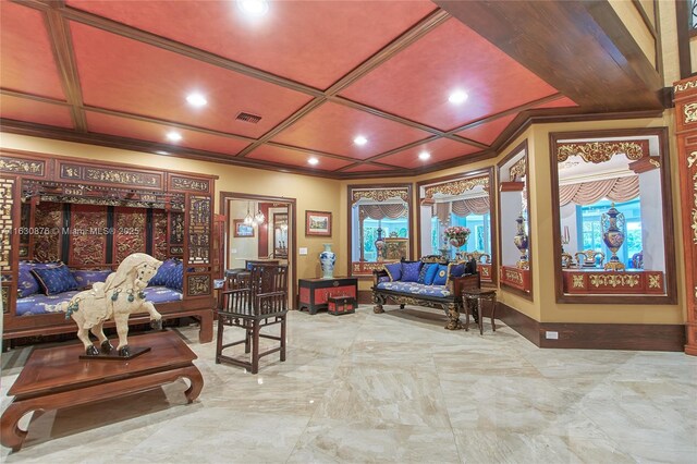 sitting room featuring lofted ceiling, light tile patterned flooring, and a wealth of natural light