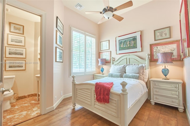 2941 Paddock Ln, Weston, FL 33331 - bedroom featuring hardwood / wood-style floors, ensuite bathroom, baseboards, and a ceiling fan