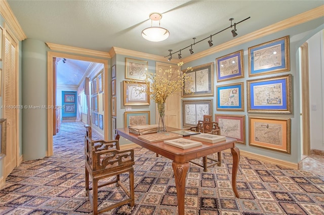 2941 Paddock Ln, Weston, FL 33331 - carpeted home office featuring baseboards, rail lighting, ornamental molding, and a textured ceiling