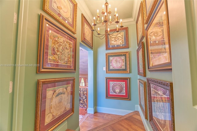 2941 Paddock Ln, Weston, FL 33331 - detailed view of a chandelier, ornamental molding, baseboards, and wood finished floors