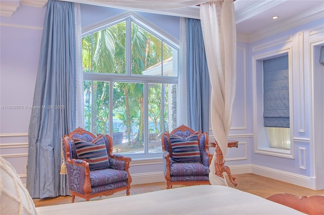 2941 Paddock Ln, Weston, FL 33331 - bedroom featuring ornamental molding, a decorative wall, and wood finished floors