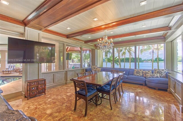 interior space featuring decorative columns, high vaulted ceiling, hardwood / wood-style flooring, and ornamental molding