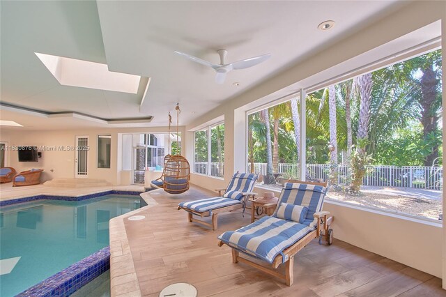 living area with a wealth of natural light and ornamental molding