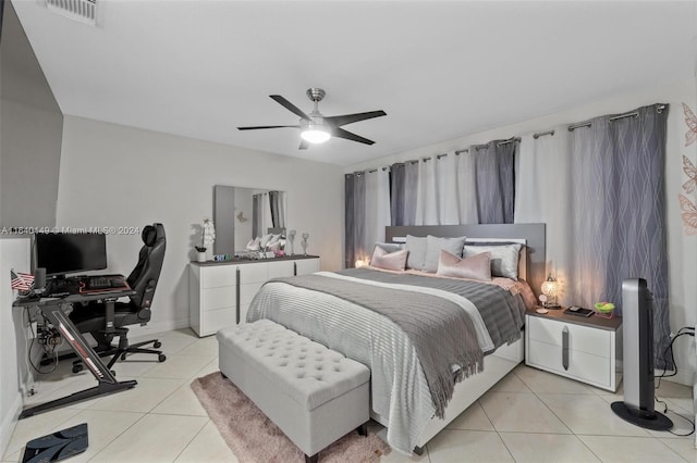 bedroom featuring ceiling fan and light tile patterned flooring