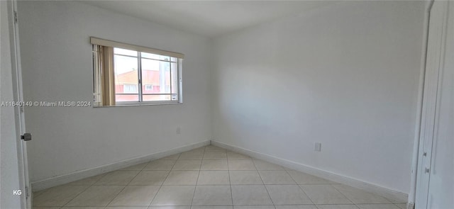 view of tiled spare room