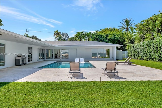 200 Harbor Dr, Key Biscayne, FL 33149 - view of swimming pool with a yard, a patio, and grilling area