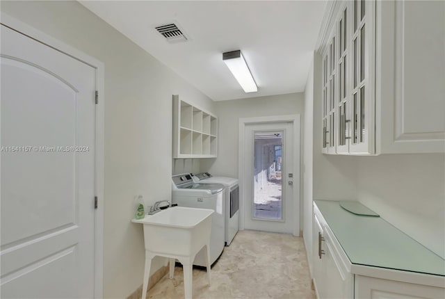 200 Harbor Dr, Key Biscayne, FL 33149 - washroom with washer and dryer and cabinet space