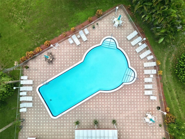 view of pool featuring a patio area