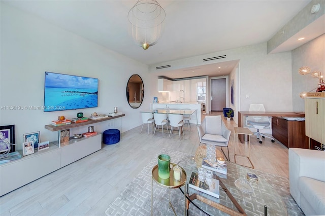 living room featuring light hardwood / wood-style flooring