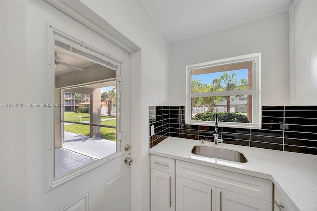 interior space with decorative backsplash and vanity