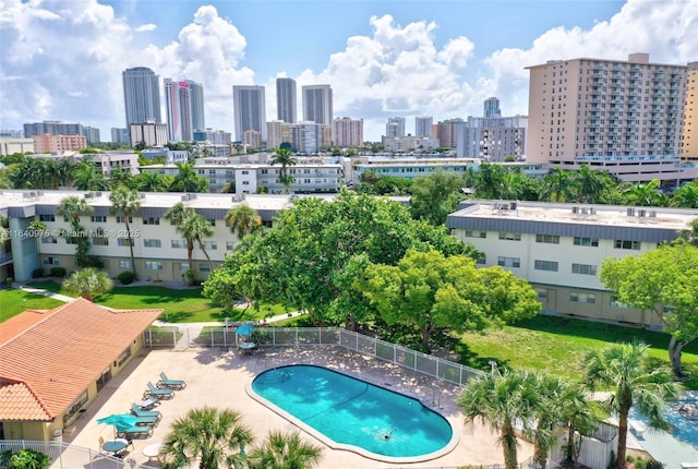 view of swimming pool with a patio