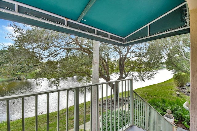 balcony featuring a water view