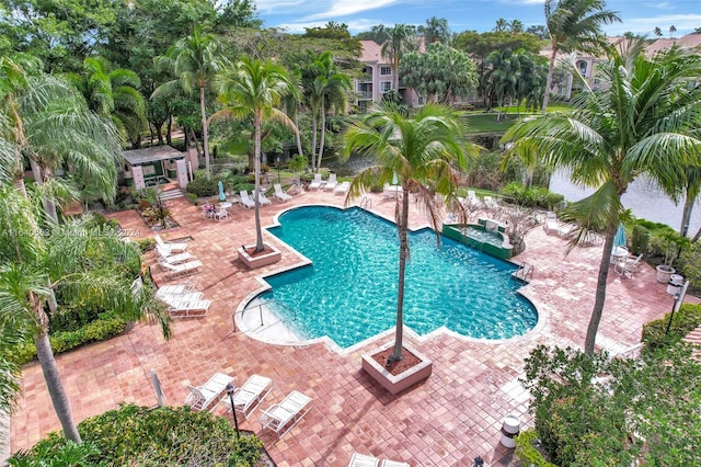 view of swimming pool with a patio area