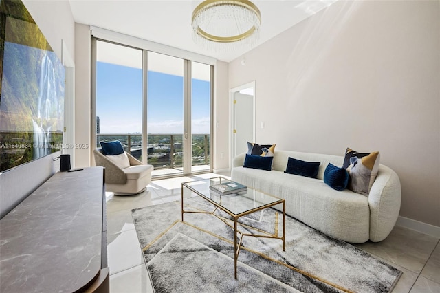 living room featuring tile patterned flooring, floor to ceiling windows, and baseboards