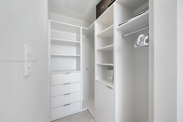 walk in closet featuring visible vents