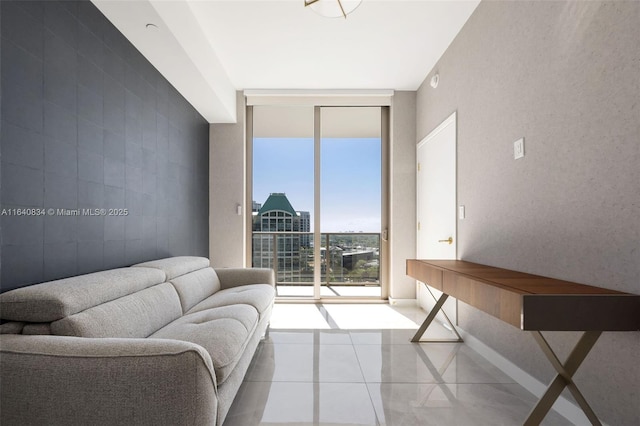 living room with tile patterned flooring and expansive windows